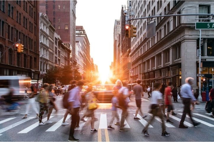 A group of people crossing a street

AI-generated content may be incorrect.